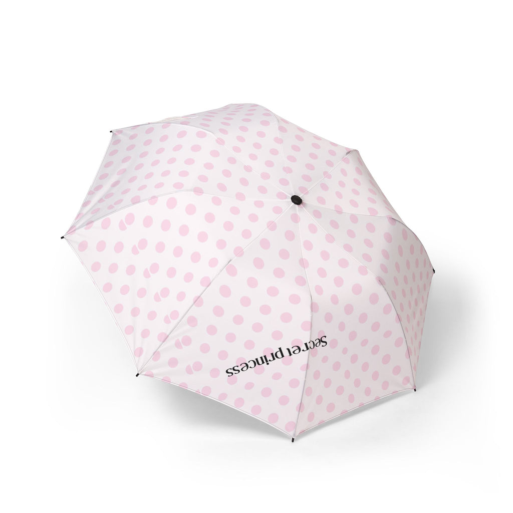 Foldable pink polka dot umbrella